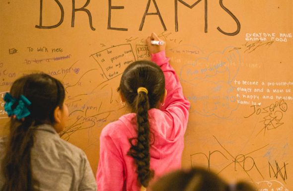 Local kids contribute to the communal vision board