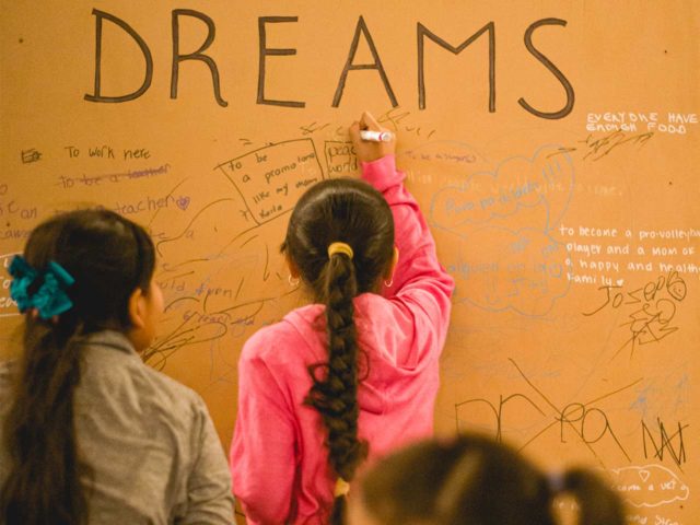 Local kids contribute to the communal vision board